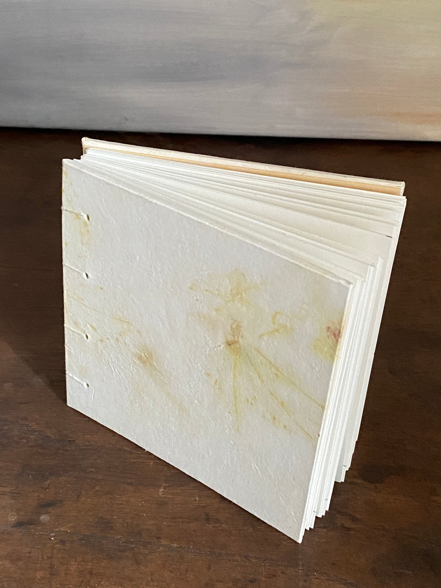 Skizzenbuch in koptischer Bindung, 11,5 x 12 mm mit Ecoprint-Einband