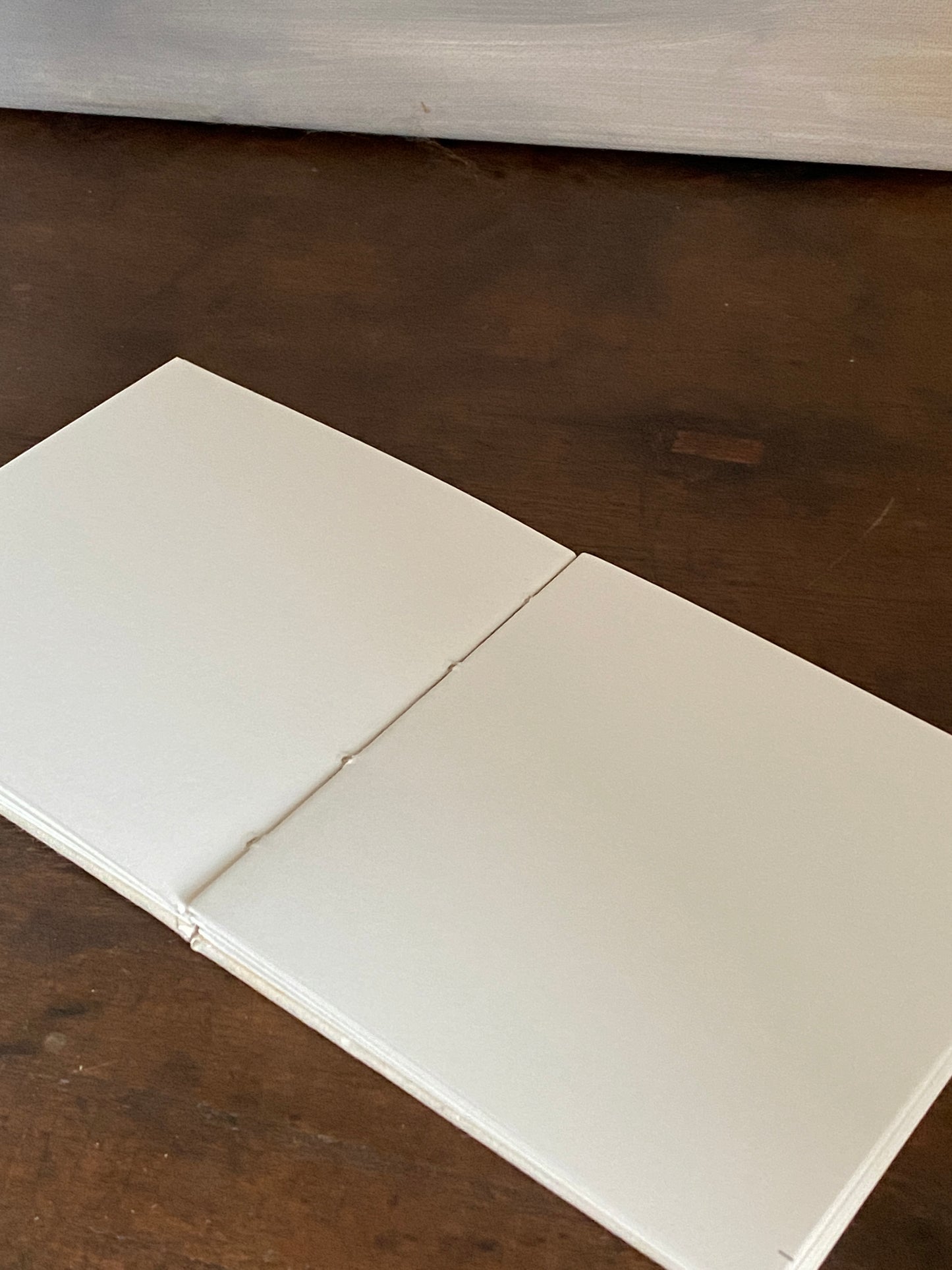 Skizzenbuch in koptischer Bindung, 11,5 x 12 mm mit Ecoprint-Einband
